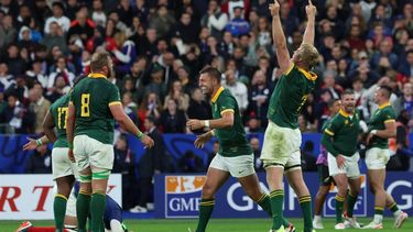2023-10-15 23:06:54 South Africa's flanker Pieter-Steph du Toit (R) lifts his hands in the air as South Africa's players celebrate victory in the France 2023 Rugby World Cup quarter-final match against France at the Stade de France in Saint-Denis, on the outskirts of Paris, on October 15, 2023. 
Emmanuel Dunand / AFP