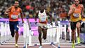 Netherlands' athlete Job Geerds, Niger's athlete Saguirou Badamassi and Spain's athlete Enrique Llopis compete in the men's 110m hurdles heats during the World Athletics Championships in Tokyo on September 15, 2025. 
Jewel SAMAD / AFP