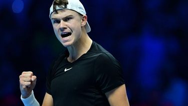 2023-11-16 22:23:53 Denmark's Holger Rune celebrates a point against  Italy's Jannik Sinner during their first round-robin match at the ATP Finals tennis tournament in Turin on November 16, 2023.
 
Tiziana FABI / AFP