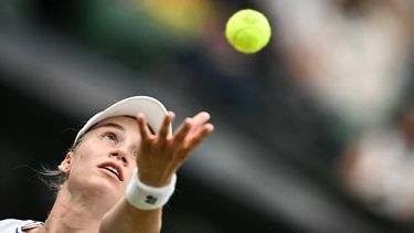 Kazakhstan's Elena Rybakina serves the ball to Russia's Anna Kalinskaya during their women's singles tennis match on the eighth day of the 2024 Wimbledon Championships at The All England Lawn Tennis and Croquet Club in Wimbledon, southwest London, on July 8, 2024. 
Ben Stansall / AFP