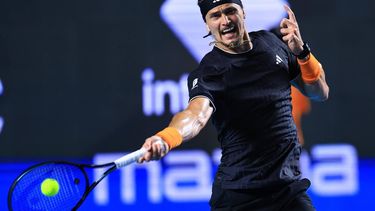 epa12775403 Alexander Zverev of Germany returns a ball against Corentin Moutet of France in a match at the Mexican Open in Acapulco, Mexico, 24 February 2026.  EPA/David Guzman