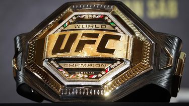 epa10413636 View of the UFC champion belt during a press conference of Mexican fighter Brandon Moreno, UFC flyweight interim champion, in Rio de Janeiro, Brazil, 18 Janaury 2023. Moreno will fight Brazilian Deiveson Figueiredo for the Ultimate Fighting Championship unification title on 21 January.  EPA/ANDRE COELHO