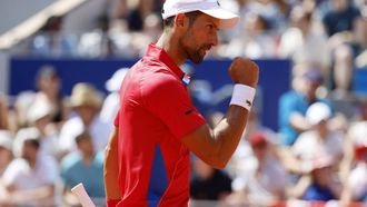epa11505657 Novak Djokovic of Serbia reacts during the Men's Singles second round match against Rafael Nadal of Spain at the Tennis competitions in the Paris 2024 Olympic Games, at the Roland Garros in Paris, France, 29 July 2024.  EPA/FRANCK ROBICHON
