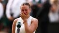 US player Amanda Anisimova speaks and reacts following her defat against Poland's Iga Swiatek at the end of their women's singles final tennis match on the thirteenth day of the 2025 Wimbledon Championships at The All England Lawn Tennis and Croquet Club in Wimbledon, southwest London, on July 12, 2025. 
HENRY NICHOLLS / AFP