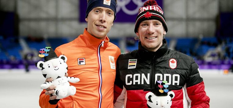 GANGNEUNG - Jorrit Bergsma (L), zilver, en Ted-Jan Bloemen, goud, in de Gangneung Oval tijdens de 10000 meter op de Olympische Winterspelen van Pyeongchang. ANP JERRY LAMPEN