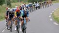 The pack rides during the fifth stage of the 76th edition of the Criterium du Dauphine cycling race, 167km between Amplepuis and Saint-Priest, central France, on June 6, 2024. 
Thomas SAMSON / AFP