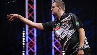 epa11619944 Gian van Veen of The Netherlands competes against his compatriot, Michael van Gerwen in the final of the 2024 PDC European Tour Hungarian Darts Trophy in Budapest, Hungary, 22 September 2024.  EPA/Robert Hegedus HUNGARY OUT