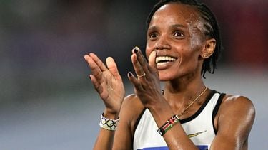 Kenya's Beatrice Chebet celebrates after winning the women's 5000m event of the Diamond League athletics meeting at the Olympic stadium in Rome on June 6, 2025. 
Tiziana FABI / AFP