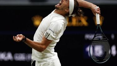 Germany's Alexander Zverev serves to Czech Republic's Jiri Lehecka during their men's singles round of 16 tennis match on the eighth day of the 2026 Wimbledon Championships at The All England Lawn Tennis and Croquet Club in Wimbledon, southwest London, on July 6, 2026. 
Adrian Dennis / AFP
