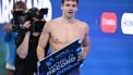 France's swimmer Leon Marchand celebrates winning a semi-final of the men's 200m individual medley swimming event and breaking the world record during the 2025 World Aquatics Championships in Singapore on July 30, 2025. 
Oli SCARFF / AFP