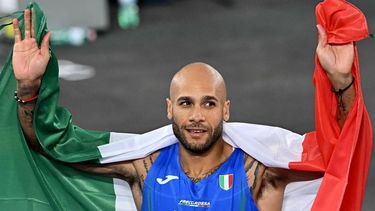 Italy's athlete Lamont Marcell Jacobs celebrates after winning gold medal in the men's 100m final during the European Athletics Championships at the Olympic stadium in Rome on June 8, 2024. 
Filippo MONTEFORTE / AFP