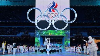 The delegation from Russia takes part in the parade of athletes, underneath the Olympics rings, during the opening ceremony of the Beijing 2022 Winter Olympic Games, at the National Stadium, known as the Bird's Nest, in Beijing, on February 4, 2022.  
Ben STANSALL / AFP
