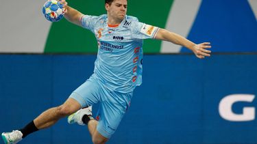 Netherlands' left wing #05 Rutger Ten Velde jumps to shoot during the Men's EURO 2024 EHF Handball European Championship main round match between The Netherlands and Portugal in Hamburg, northern Germany, on January 23, 2024. 
Odd ANDERSEN / AFP
