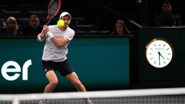 2023-10-30 17:29:18 Great Britain's Andy Murray plays a backhand return to Australia's Alex De Minaur during their men's singles match on day one of the Paris ATP Masters 1000 tennis tournament at the Accor Arena - Palais Omnisports de Paris-Bercy - in Paris on October 30, 2023. 
Dimitar DILKOFF / AFP