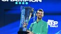 2023-11-19 20:55:37 epa10985338 Novak Djokovic of Serbia poses with the trophy after winning his singles finals match against Jannik Sinner of Italy at the Nitto ATP Finals tennis tournament in Turin, Italy, 19 November 2023.  EPA/ALESSANDRO DI MARCO
