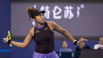 epa11635938 Naomi Osaka of Japan in action during her Round of 16 match against Coco Gauff of USA in the China Open tennis tournament in Beijing, China, 01 October 2024.  EPA/JESSICA LEE