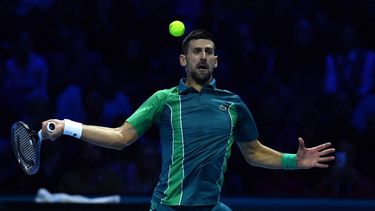 2023-11-12 21:59:00 Serbia's Novak Djokovic returns to Denmark's Holger Rune during their first round-robin match at the ATP Finals tennis tournament in Turin on November 12, 2023.
 
Tiziana FABI / AFP