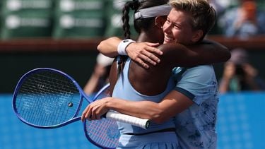 USA’s Asia Muhammad and Netherland’s Demi Schuurs (R) celebrate after defeating Slovakia’s Tereza Mihalikova and Britain’s Olivia Nicholls during the women’s doubles final match at the BNP Paribas Open at the Indian Wells Tennis Garden in Indian Wells, California on March 15, 2025. 
Patrick T. Fallon / AFP