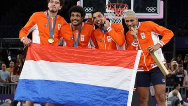 Gold medallists Netherlands celebrate on the podium of the men's 3x3 basketball during the Paris 2024 Olympic Games at La Concorde in Paris on August 5, 2024. 
David GRAY / AFP