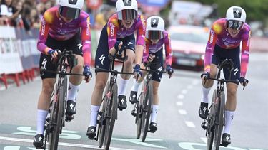 Netherland's SD Worx-Protime team riders cross the finish line of the stage 1 of the Vuelta a Espana women's race, a 16 km race against the clock between Valencia and Valencia, on April 28, 2024. 
JOSE JORDAN / AFP