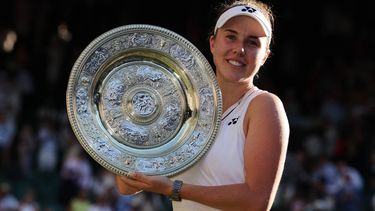 Czech Republic's Linda Noskova poses with the winner's trophy, the Venus Rosewater Dish, after winning against Czech Republic's Karolina Muchova during their women's singles final tennis match on the thirteenth day of the 2026 Wimbledon Championships at The All England Lawn Tennis and Croquet Club in Wimbledon, southwest London, on July 11, 2026. 
Adrian Dennis / AFP