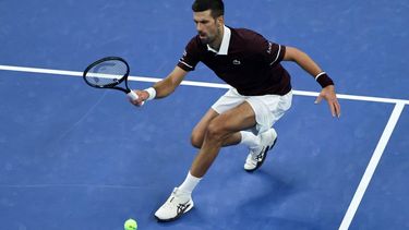 epa13282870 Novak Djokovic of Serbia in action against Daniil Medvedev of Russia during their men’s semi-final singles match at the China Open tennis tournament in Beijing, China, 05 October 2026.  EPA/ANDRES MARTINEZ CASARES
