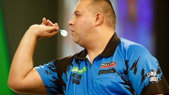 epa11779800 Jermaine Wattimena of the Netherlands in action during the opening session of the Paddy Power World Darts Championship at Alexandra Palace in London, Britain 15 December 2024.  EPA/DAVID CLIFF