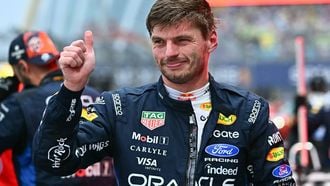 Red Bull Racing's Dutch driver Max Verstappen celebrates winning the sprint race ahead of the Formula One Singapore Grand Prix at the Marina Bay Street Circuit in Singapore on October 10, 2026. 
Lillian SUWANRUMPHA / AFP