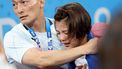 epa11501675 Uta Abe of Japan is consoled by a coach after losing her bout in the Women -52kg Elimination Round of 16 of the Judo competitions in the Paris 2024 Olympic Games, at the Champs-de-Mars Arena in Paris, France, 28 July 2024.  EPA/DANIEL IRUNGU