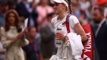 Kazakhstan's Elena Rybakina reacts as she leaves Centre Court following her defeat against Czech Republic's Barbora Krejcikova in their women's singles semi-final tennis match on the eleventh day of the 2024 Wimbledon Championships at The All England Lawn Tennis and Croquet Club in Wimbledon, southwest London, on July 11, 2024. Barbora Krejcikova won 3-6, 6-3, 6-4.
HENRY NICHOLLS / AFP