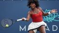 Venus Williams returns a shot against while playing with Hailey Baptiste (not pictured) against Shuai Zhang and Taylor Townsend during a women's doubles match on day 3 of the Mubadala Citi DC Open 2025 at William H.G. FitzGerald Tennis Center on July 23, 2025 in Washington, DC. Venus Williams, who made a comeback last week after more than a year's hiatus from competitive tennis, will compete alongside Reilly Opelka in mixed doubles at the US Open. Williams, a seven-time Grand Slam singles champion who turned 45 last month, and US compatriot Opelka were among 14 teams named on July 29, 2025 to the revamped August 19-20 event by the US Tennis Association.

Scott Taetsch / GETTY IMAGES NORTH AMERICA / AFP