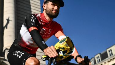 INEOS Grenadiers team's Italian rider Filippo Ganna cycles through Lille's city center during the official teams presentation days prior to the start of the 112th edition of the Tour de France cycling race, in Lille, northern France, on July 3, 2025. 
Marco BERTORELLO / AFP