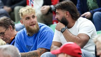 epa11964526 US content creator and boxer Jake Paul (L) at the ISU Speed Skating Single Distances World Championships in Hamar, Norway, 14 March 2025.  EPA/Geir Olsen  NORWAY OUT