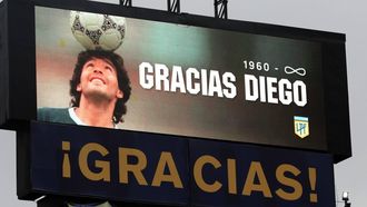 epa08852132 The stadium's screen displays a image of Diego Maradona and the legend '1960-infinity Thanks Diego' as part of a tribute to the late football legend during a match between Boca Juniors and Newell's Old Boys for the 2020 Argentine Primera Division, at La Bombonera stadium, in Buenos Aires, 29 November 2020. The Argentine football championship has been renamed to honour the late Diego Maradona.  EPA/ALEJANDRO PAGNI / POOL