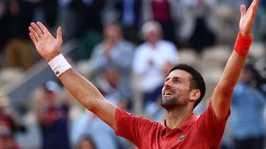 Serbia's Novak Djokovic celebrates after winning against Argentina's Francisco Cerundolo at the end of their men's singles round of sixteen match on Court Philippe-Chatrier on day nine of the French Open tennis tournament at the Roland Garros Complex in Paris on June 3, 2024. 
Emmanuel Dunand / AFP