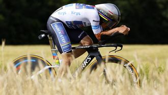 epa11459482 White jersey Belgian rider Remco Evenepoel of Soudal Quick-Step in action during the seventh stage of the 2024 Tour de France cycling race 25km individual time-trial (ITT) from Nuits-Saint-Georges to Gevrey-Chambertin, France, 05 July 2024.  EPA/KIM LUDBROOK