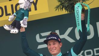 2023-07-21 17:34:24 epa10760494 Belgian rider Jasper Philipsen of team Alpecin-Deceuninck celebrates on the podium retaining the best sprinter's green jersey after the 19th stage of the Tour de France 2023, a 173kms race from Moirans-en-Montagne to Poligny, France, 21 July 2023.  EPA/MARTIN DIVISEK