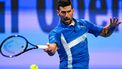 Serbia's Novak Djokovic hits a return to Italy's Matteo Berettini during their men's singles match at the ATP Qatar Open tennis tournament in Doha on February 18, 2025. 
Mahmud HAMS / AFP