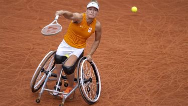 This handout photograph taken and released by OIS/IOC on September 4, 2024, shows Netherlands' Diede De Groot returning the ball against China's Ziying Wang (Not Pictured) during her Women's Singles Semi-final match on the Court Suzanne Lenglen at the Roland-Garros Stadium during the Paris 2024 Paralympic Games. 
Emma Da Silva / OIS/IOC / AFP