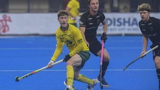 Australia's Matt Dawson (L) fights for the ball during the men's semi-final match between Australia and Germany at the FIH Odisha Field Hockey Men's World Cup 2023, in Bhubaneswar on January 27, 2023.  
Dibyangshu SARKAR / AFP