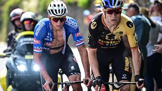 2023-07-11 16:28:45 Jumbo-Visma's Belgian rider Wout Van Aert (R) and Alpecin-Deceuninck's Dutch rider Mathieu Van Der Poel (L) cycle in the ascent of the Col de la Chapelle-Marcousse during the 10th stage of the 110th edition of the Tour de France cycling race, 167,5 km between Vulcania and Issoire, in the Massif Central highlands in central France, on July 11, 2023. 
Marco BERTORELLO / AFP