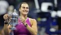 Belarus's Aryna Sabalenka holds up the trophy after defeating USA's Jessica Pegula during their women's final match on day thirteen of the US Open tennis tournament at the USTA Billie Jean King National Tennis Center in New York City, on September 7, 2024. 
CHARLY TRIBALLEAU / AFP