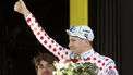epa11485892 Slovenian rider Tadej Pogacar of UAE Team Emirates celebrates on the podium wearing the best climber's Polka Dot jersey following the 18th stage of the 2024 Tour de France cycling race over 179km from Gap to Barcelonnette, France, 18 July 2024.  EPA/SEBASTIEN NOGIER