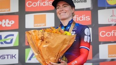 epa12059003 Third placed Dutch Demi Vollering of team FDJ - SUEZ celebrates on the podium for the Liege Bastogne Liege cycling classic race for Elite Women over 152,9 km from Bastogne to Liege, Belgium, 27 April 2025.  EPA/OLIVIER MATTHYS