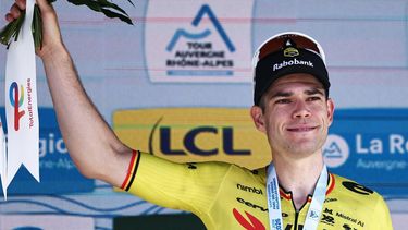 Stage winner Team Visma | Lease a Bike's Belgian rider Wout Van Aert celebrates on the podium of the 5th stage of the Tour Auvergne-Rhone-Alpes cycling race (formerly known as the Criterium du Dauphine), 195,8km between Saint-Chamond and Villars-les-Dombes, central France, on June 11, 2026. 
Anne-Christine POUJOULAT / AFP