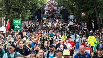 Participants run during the Paris Marathon, on April 13, 2025. 
Xavier GALIANA / AFP