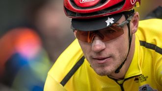 Tudor Cycling team's Dutch rider Maikel Zijlaard wearing the overall leader's yellow jersey rides during the first stage of the Tour of Romandy UCI cycling World tour 165,7 km from Chateau d'Oex to Fribourg, on April 24, 2024. 
Fabrice COFFRINI / AFP