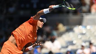 epa12660169 Felix Auger-Aliassime of Canada serves against Nuno Borges of Portugal during their men's singles first round match on day 2 of the 2026 Australian Open tennis tournament at Jon Cain Arena at Melbourne Park in Melbourne, Australia, 19 January 2026.  EPA/LUKAS COCH AUSTRALIA AND NEW ZEALAND OUT