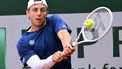 epa11379269 Tallon Griekspoor of the Netherlands in action during his Men's Singles 2nd round match against Luciano Darderi of Italy during the French Open Grand Slam tennis tournament at Roland Garros in Paris, France, 30 May 2024.  EPA/CAROLINE BLUMBERG
