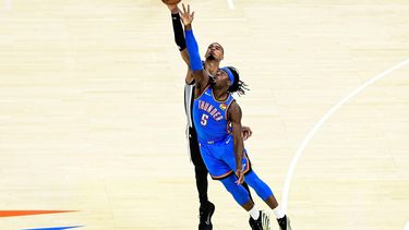 epa13005908 Oklahoma City Thunder guard Luguentz Dort (front) goes for the free ball against San Antonio Spurs forward/center Victor Wembanyama (back) during game 7 of the NBA West Conference Finals between Oklahoma City Thunder and San Antonio Spurs in Oklahoma City, Oklahoma, USA, 30 May 2026.  EPA/GERALD LEONG SHUTTERSTOCK OUT